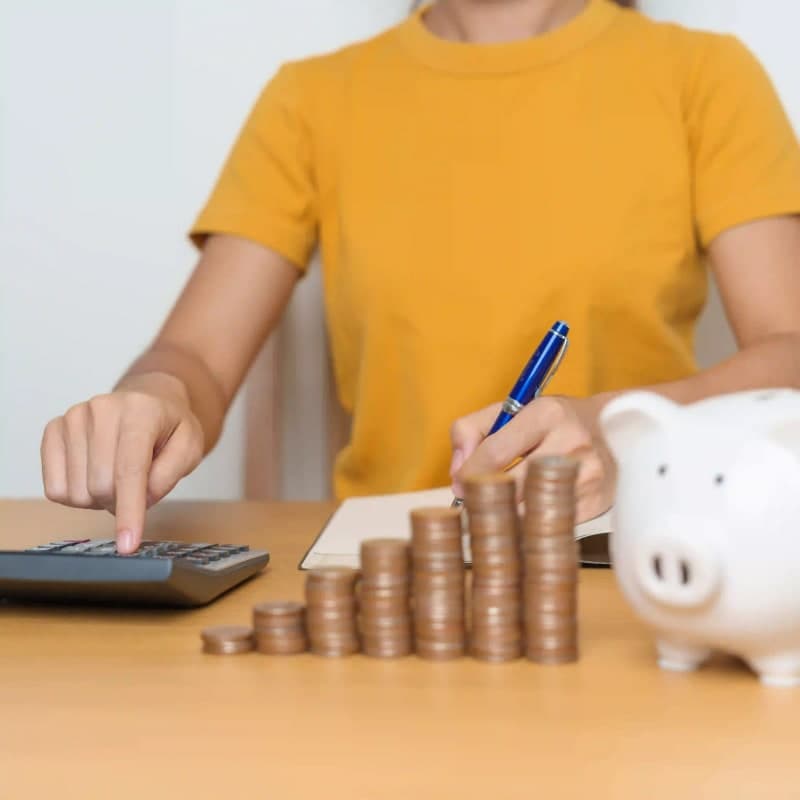 Man working on laptop in airplane