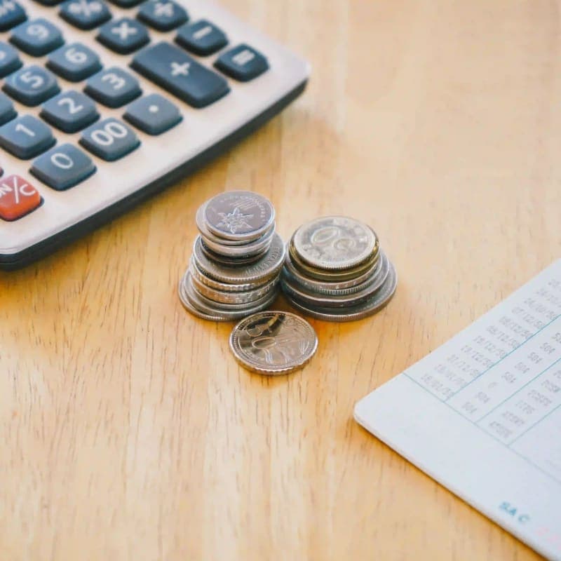 Man working on laptop in airplane